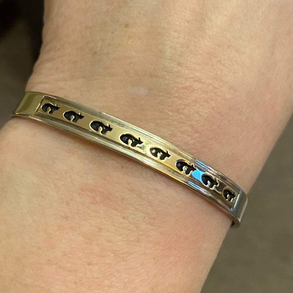 STERLING SILVER AND 14K YELLOW GOLD NAVAJO P. SKEETS BEAR CUFF BRACELET